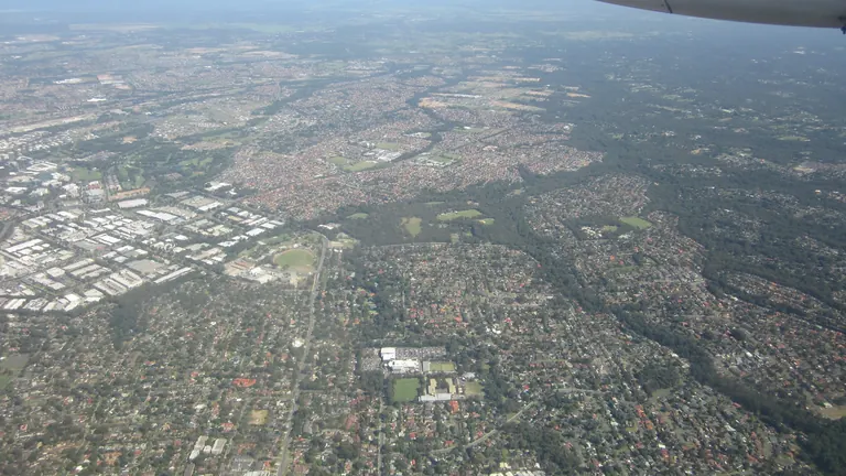 Suburbs meeting bushland in Sydney's north-west, from the air